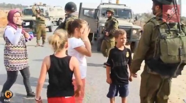 http://www.theblaze.com/stories/2012/11/06/i-spit-in-your-face-mother-goads-palestinian-girl-to-push-scream-at-idf-soldiers-in-propaganda-video-that-backfires/