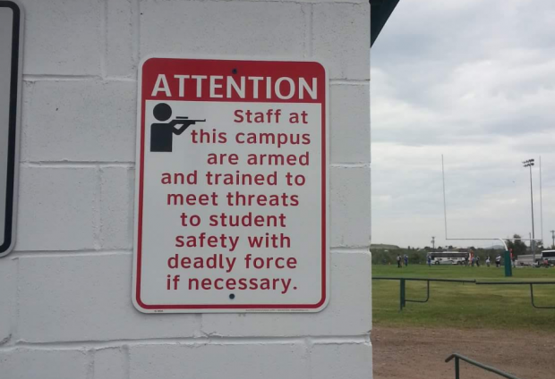 Sign-Texas-High-School-Staff-Trained-To-Meet-Threats-With-Deadly-Force1-e1440897721395-620x424.png