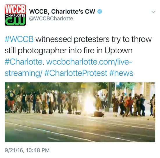 Charlotte riots try to throw photographer into fire